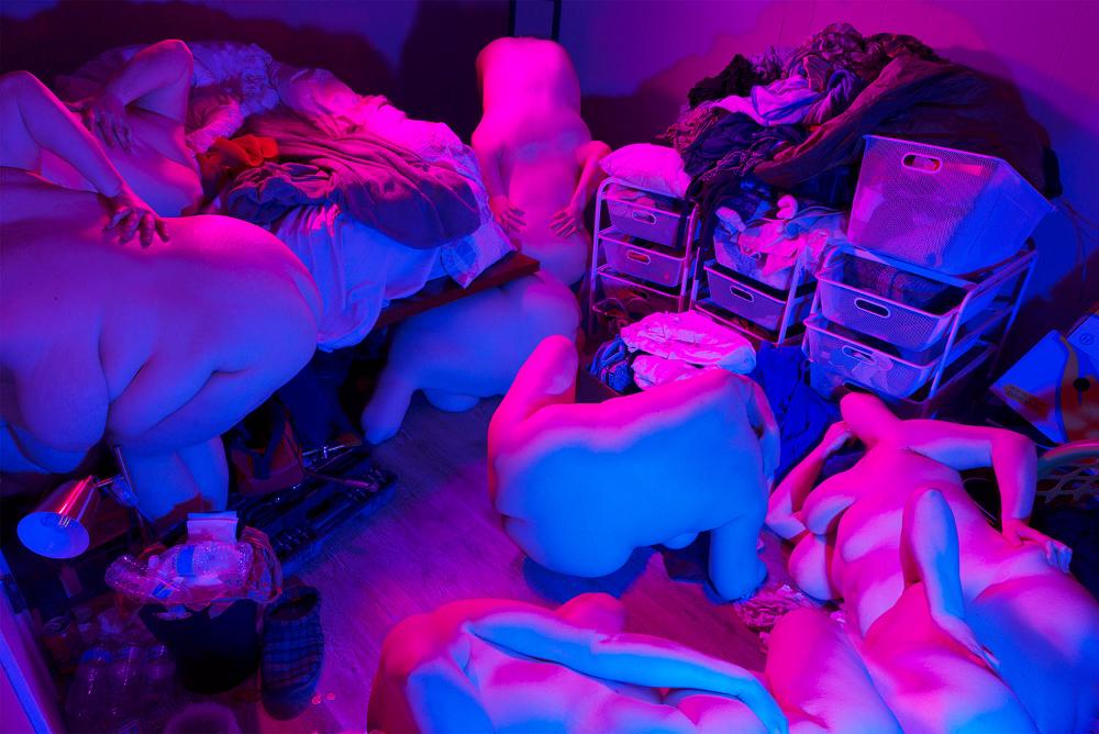 Composite image As part of the 2018 student portfolio for Rachel Britton, this is an image of  several morphed human bodies stacked on top on each other with a purple and blue tints. using vibrant colors